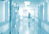 IV drip in a hospital corridor with a blurred background
