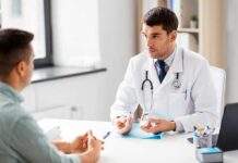 Doctor explaining glucose meters to a patient
