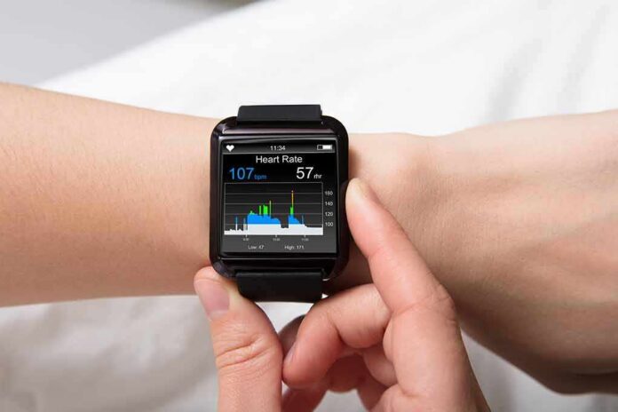 smartwatch displaying heart rate on a person's wrist
