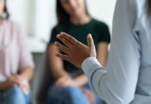 Phone Addiction’s Cure? Not What You Think Speaker gesturing during a small group discussion