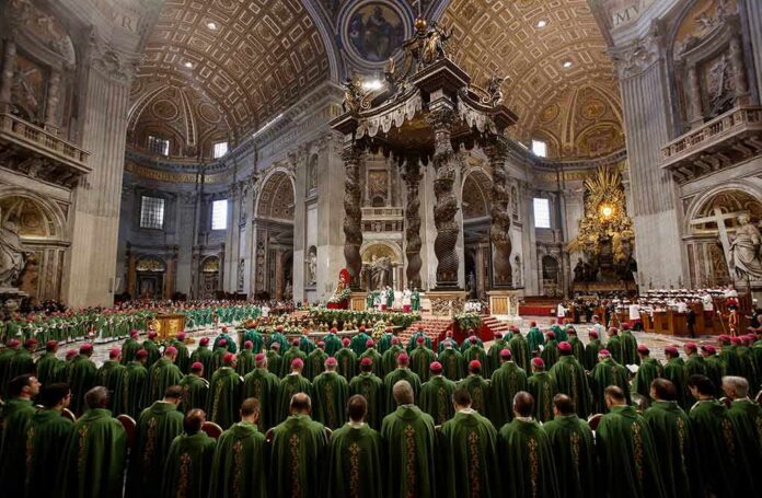 Jonathan Cyprien among clergy during a mass in a grand cathedral interior